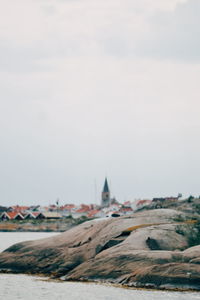 Buildings in city against sky