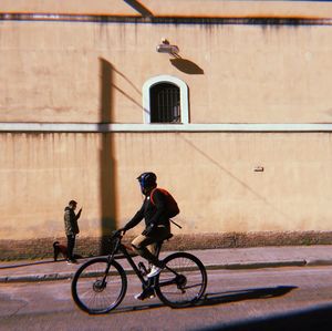 Bicycles riding bicycle on street