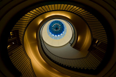 Low angle view of spiral staircase in building