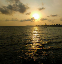 Scenic view of sea against sky during sunset