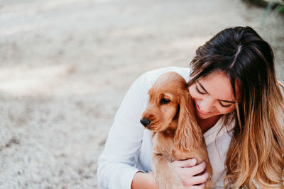 Woman with dog at park