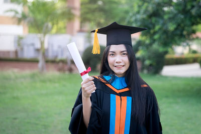 Smiling young woman wearing hat