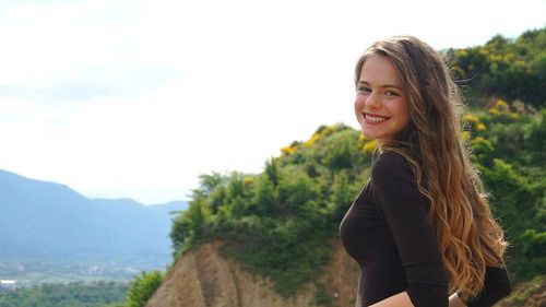 Portrait of smiling young woman