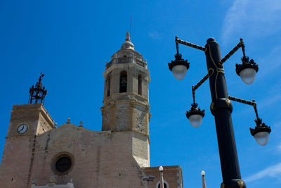 Low angle view of building against blue sky