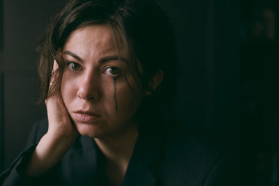 Close-up portrait of young woman