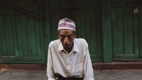 Portrait of man standing outdoors