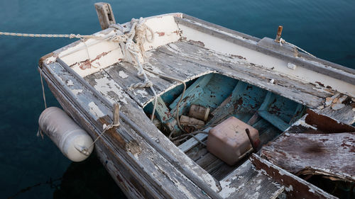 Abandoned boat in water