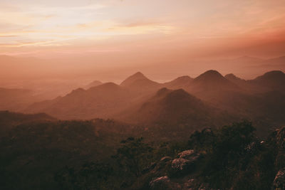 Scenic view of mountains against sky during sunset