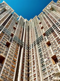Low angle view of modern buildings against sky