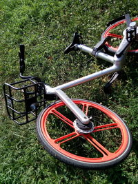 High angle view of bicycle parked on field