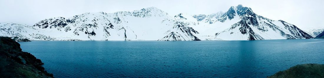 Panoramic view of river against snowcapped andes