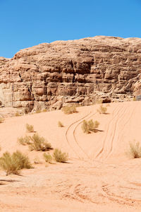 View of desert against clear sky