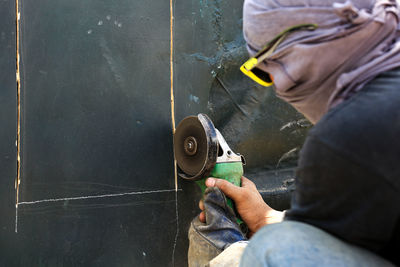 Man working on metal