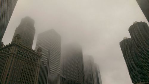 Low angle view of modern cityscape