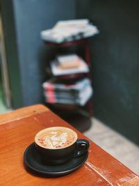 Coffee in cup on table