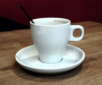 Close-up of coffee cup on table