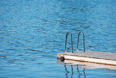 High angle view of swimming pool in lake