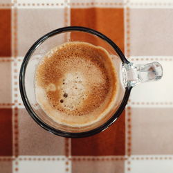 Close-up of coffee cup on table