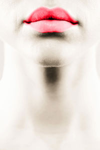 Cropped image of woman with red lipstick