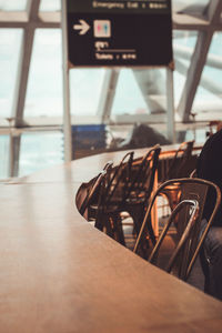 Man sitting on chair at airport