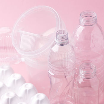 HIGH ANGLE VIEW OF EMPTY GLASS BOTTLE