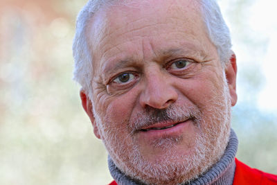 Close-up portrait of man wearing sunglasses