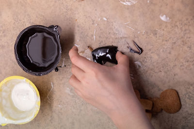 Directly above shot of person preparing food on table