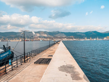 Pier over sea against sky