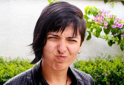 Close-up portrait of woman making face