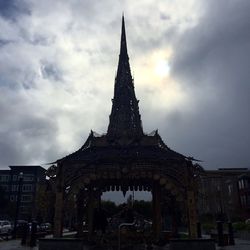 Temple against cloudy sky