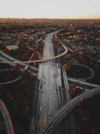 High angle view of highway in city during sunset