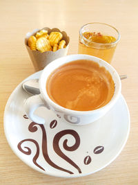 High angle view of coffee on table