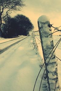 Snow on field against sky