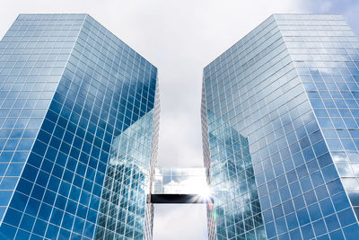 Low angle view of modern buildings against sky