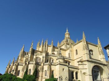 Low angle view of cathedral against clear blue sky