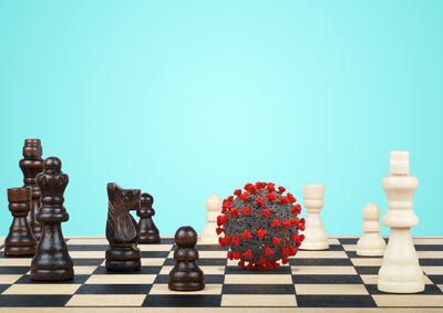 Close-up of chess pieces against the background