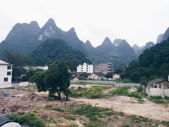 Houses on mountain range