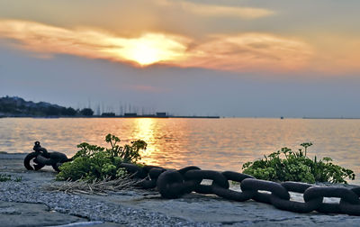 Scenic view of sea against sky at sunset