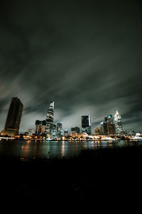 Illuminated buildings in city at night