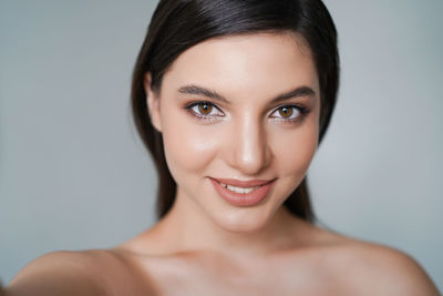 Portrait of a smiling young woman