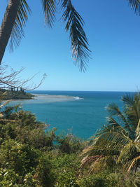 Scenic view of sea against clear blue sky