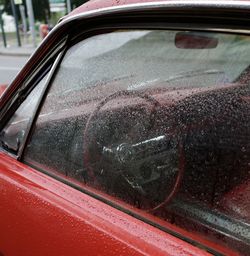 Close-up of wet car window