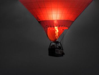 Low angle view of illuminated light bulb