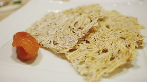 Close-up of served food in plate