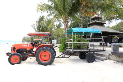 Tractor on field against sky
