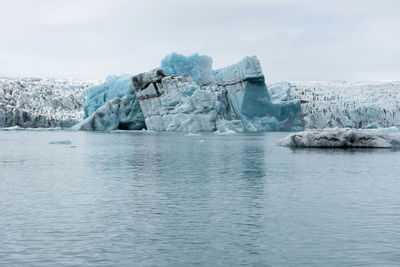 Floating icebergs in jokulsarlon glacial lagoon, iceland. global warming