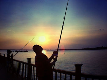 Scenic view of sea at sunset