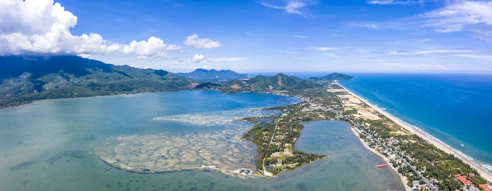 Panoramic view of sea and shore against sky