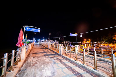 Street lights on footpath at night