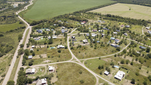 High angle view of road amidst buildings